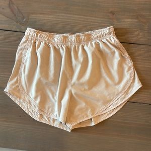 Nike Tempo Shorts - color is a tan-ish cream/gray
